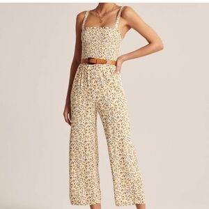 NWT Abercrombie yellow floral smocked jumpsuit with tie belt. Size large